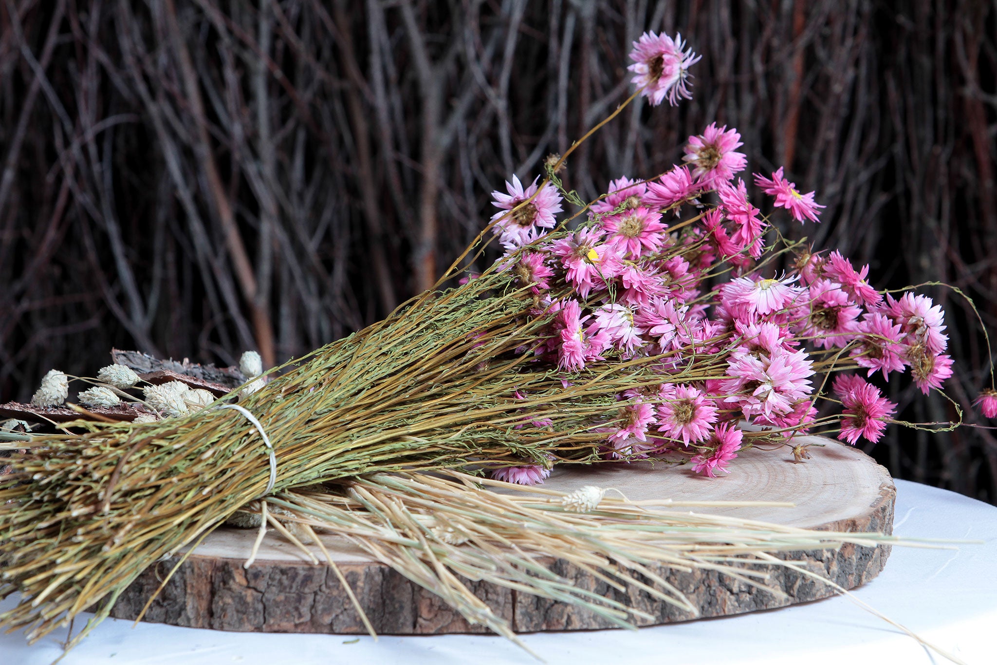 Dried pink flowers in paper